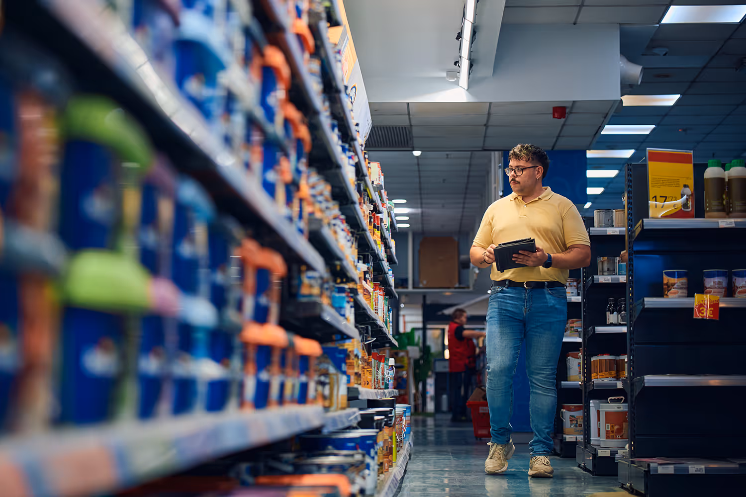 A man checking inventory in a store