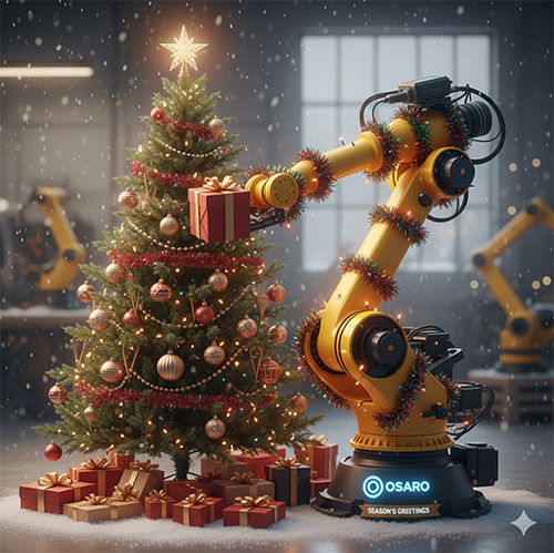 A Christmas tree and robotic arm next to each other.