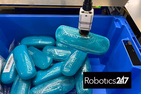 robotic arm picking Zenni glasses cases