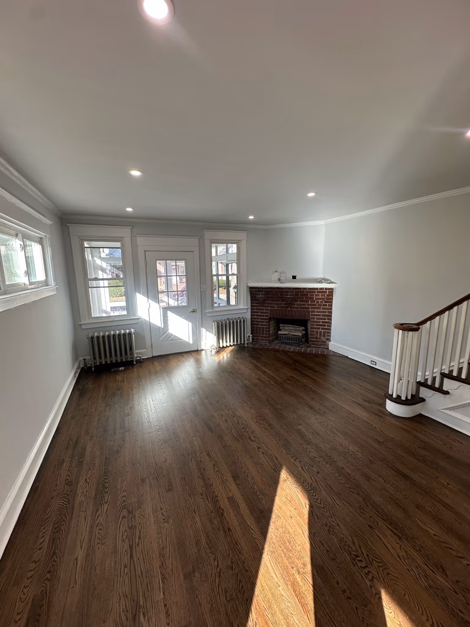 Professional flooring upgrade in a Marlton living room by Pappy and Sons Construction