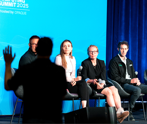 Panel sitting at a speaking event