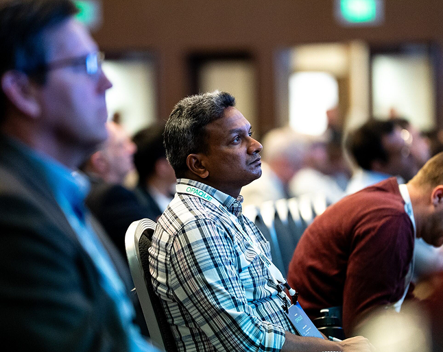 People sitting listening to a speaker at Confidential Computing Summit 2025