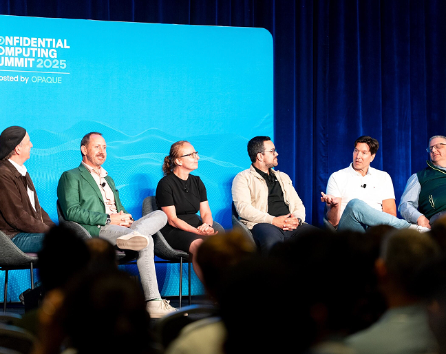 Panel sitting at a speaking event