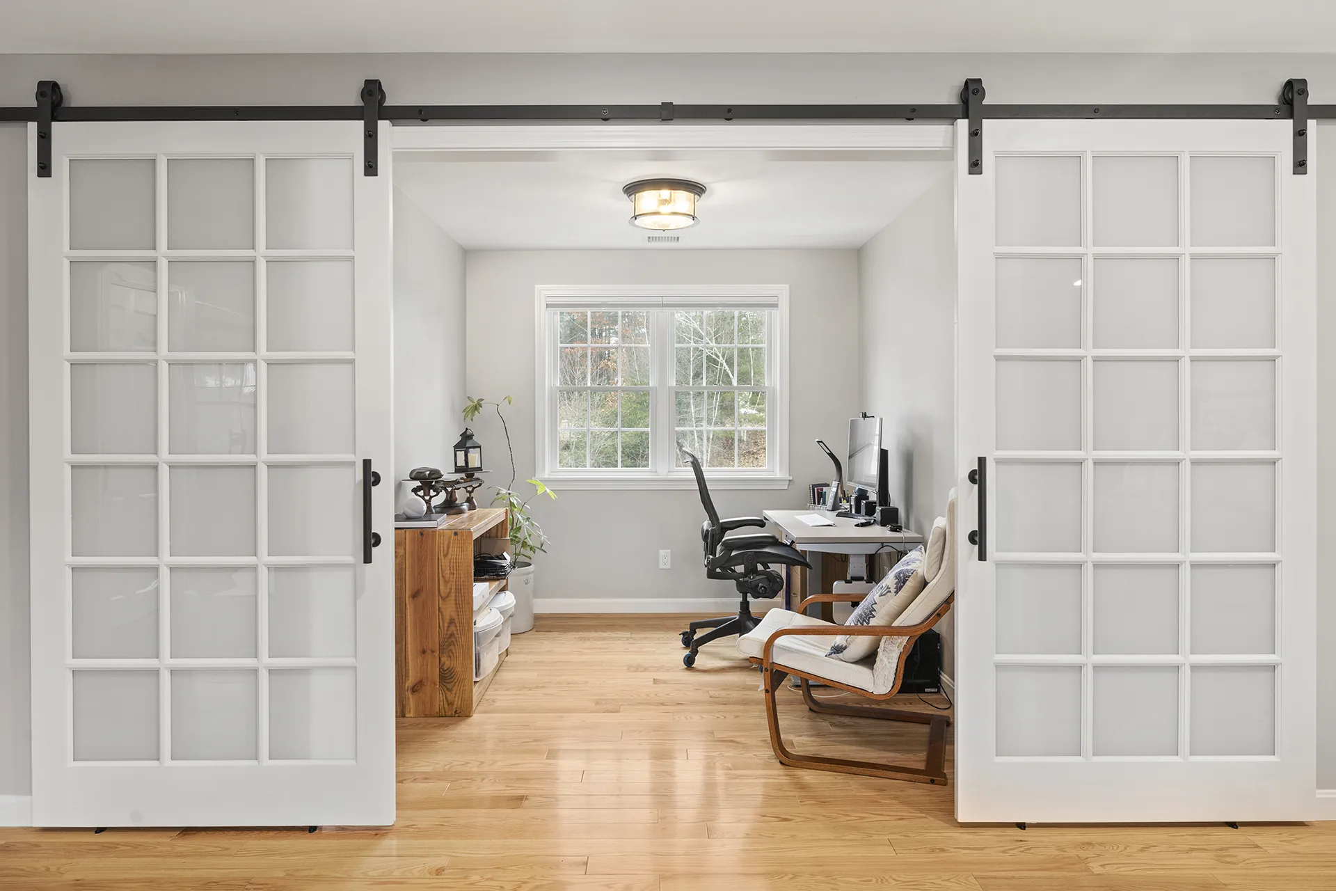 Above-garage primary suite addition in Pelham, NH — dressing area