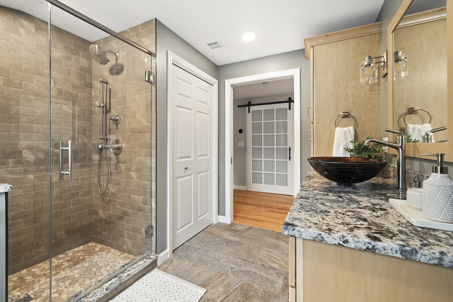 Pelham, NH bathroom renovation — earth-toned tile and walk-in shower