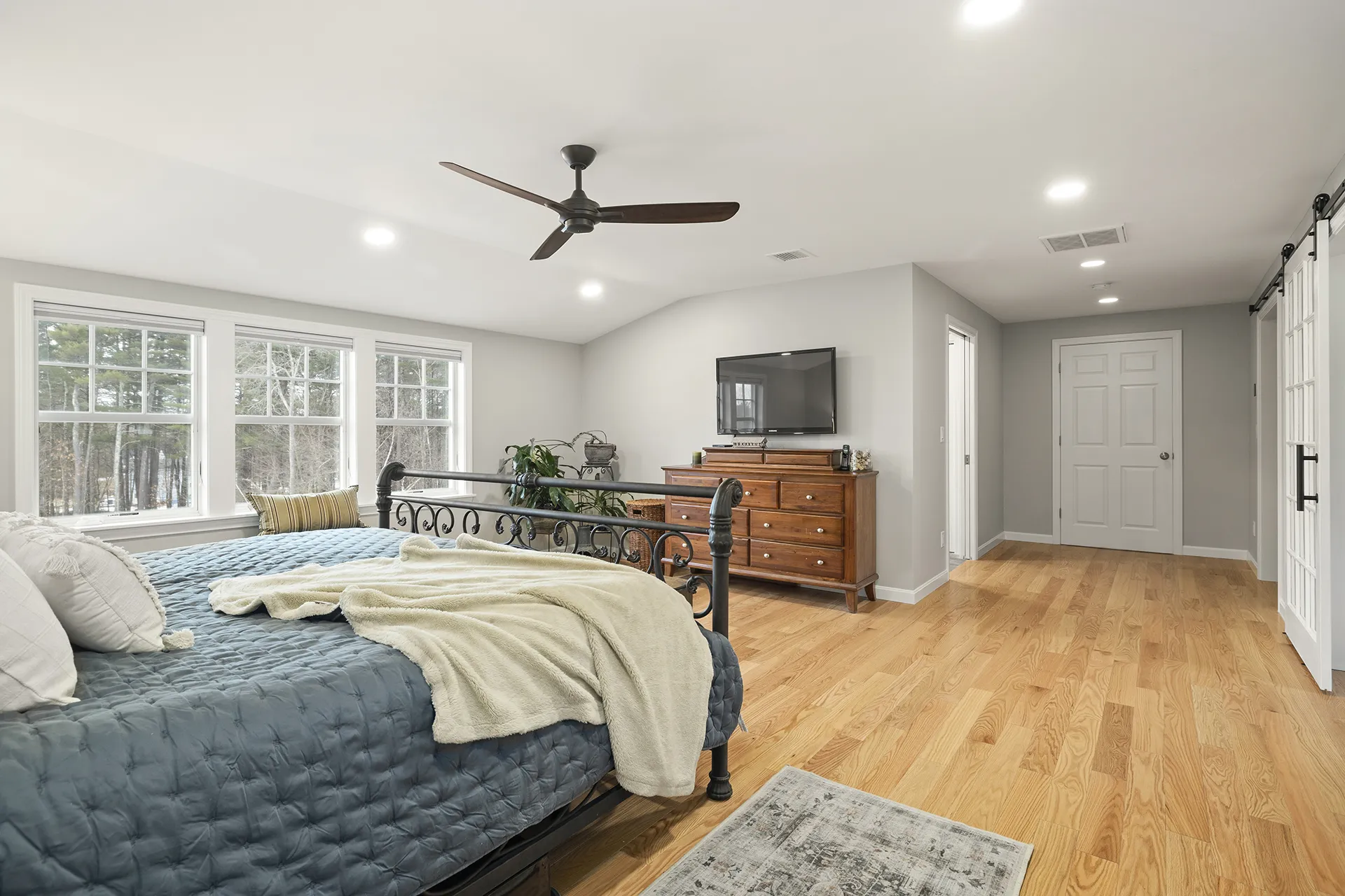 Primary suite addition by Oak Hill Design & Build — adjoining private bathroom