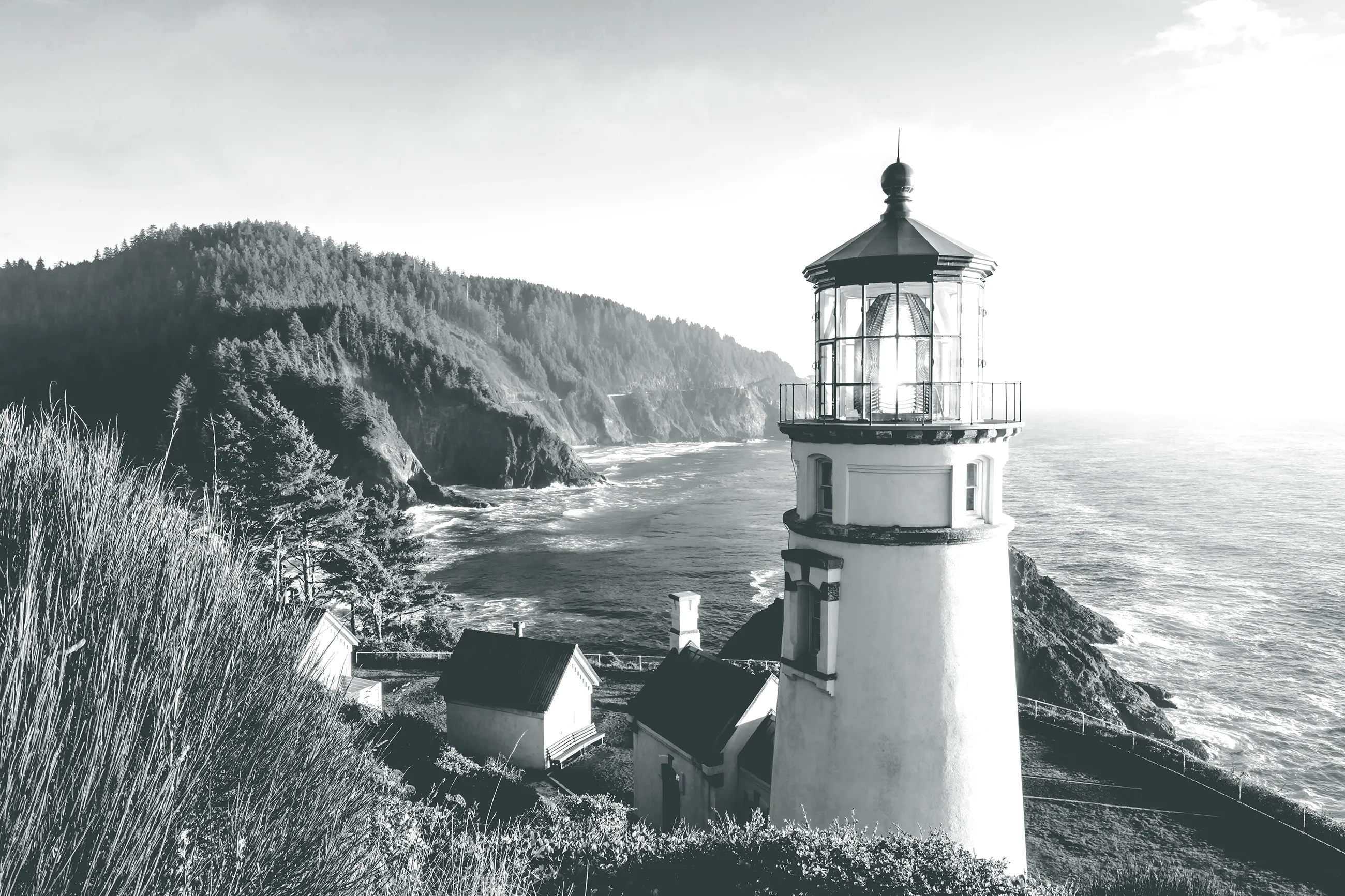 Iconic Oregon lighthouse overlooking rugged Pacific coastline