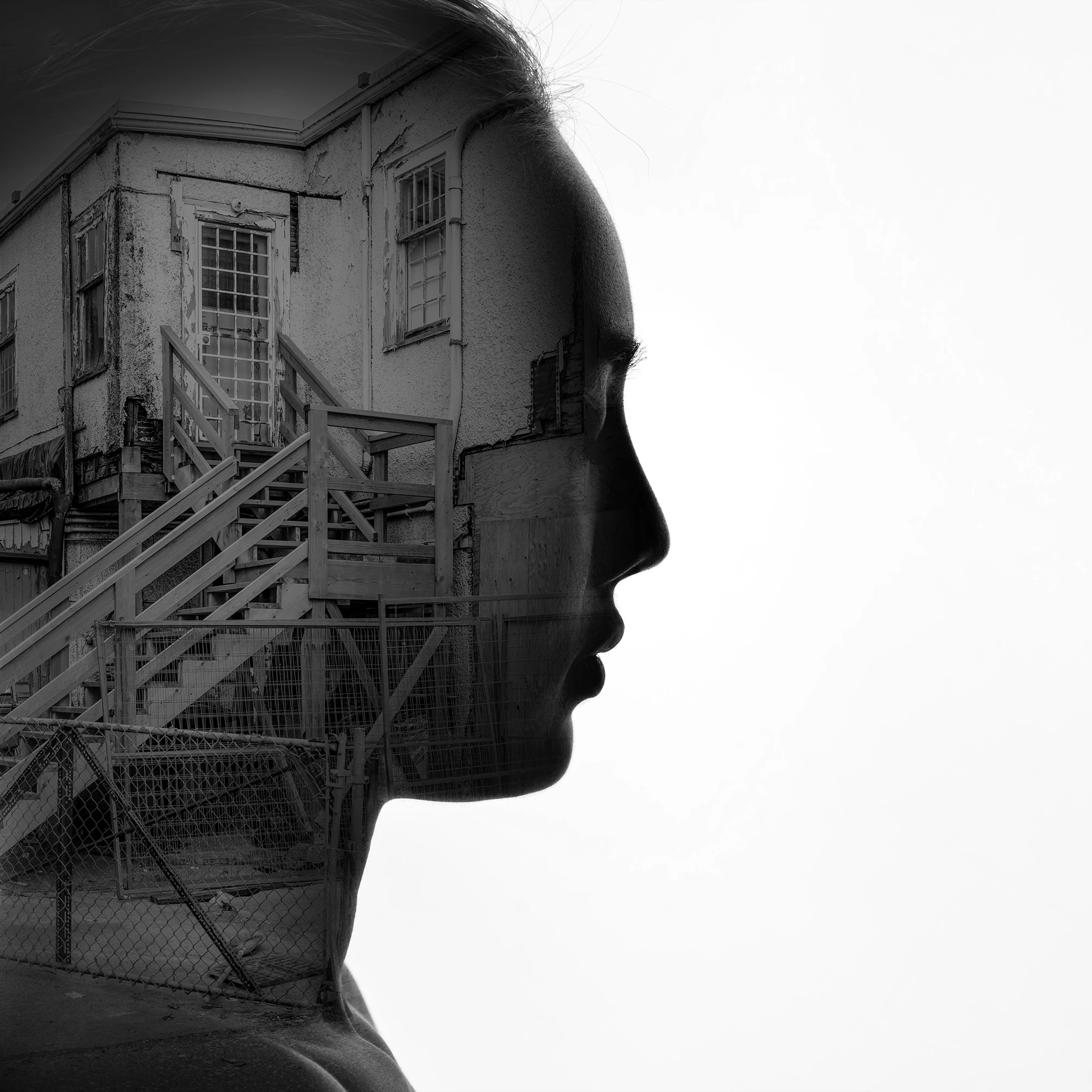 Silhouette face double exposure with old house facade