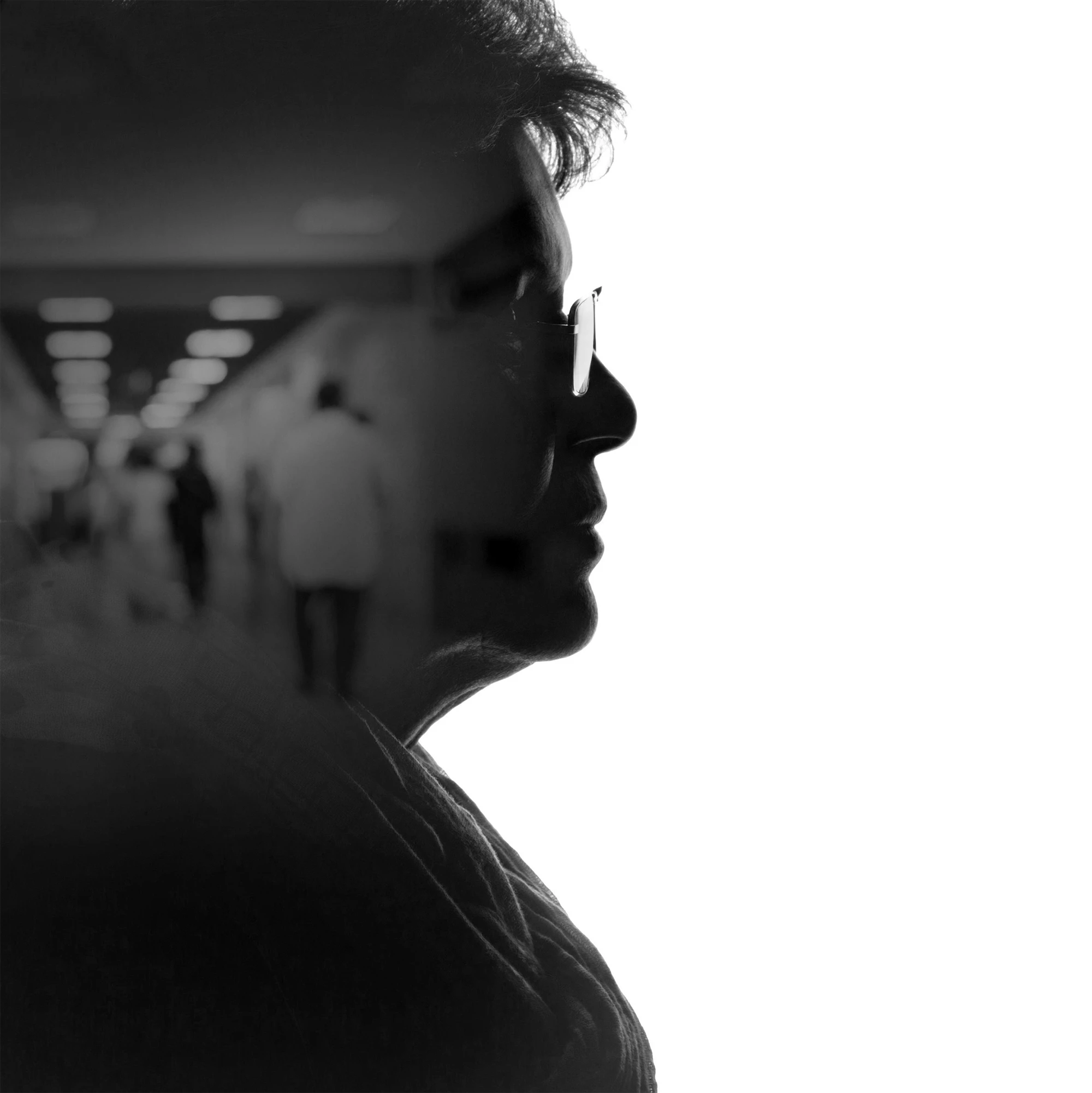 Silhouette portrait blended with hospital hallway scene