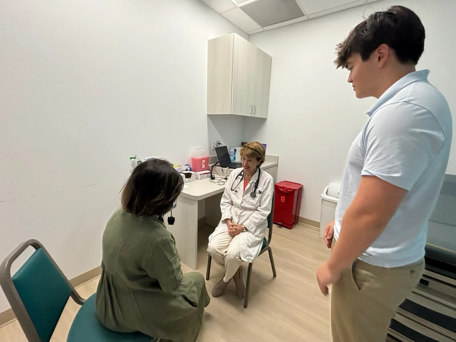Cody interpreting during a patient appointment