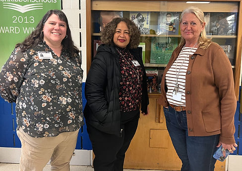 MKHC Staff with the community liaison at Summit Hall Elementary School