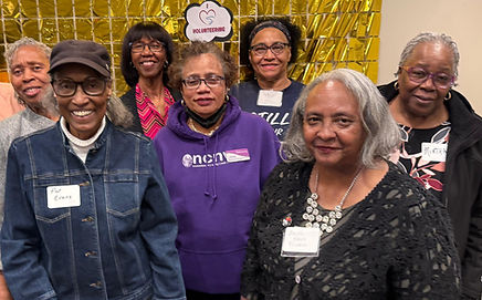 Hettie (center in purple) with other members of Mt. Calvary Baptist church at Reach's Volunteer Appreciation Event in spring 2025