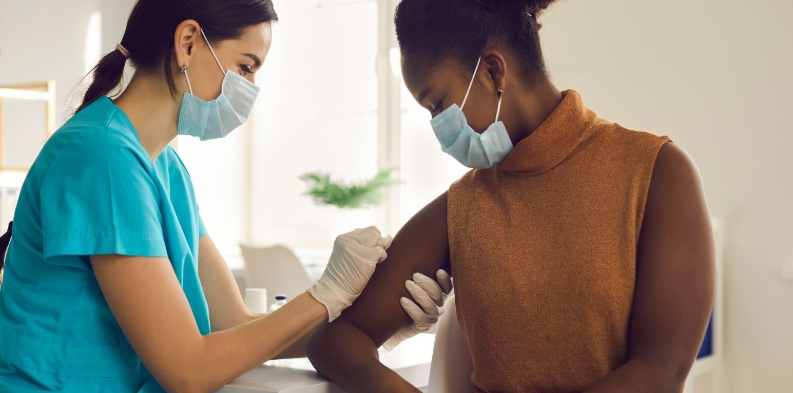 man receiving a vaccine