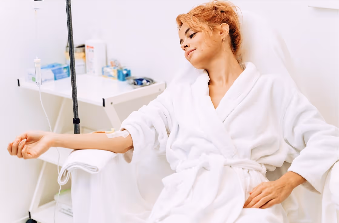 Woman receiving IV therapy at medical spa