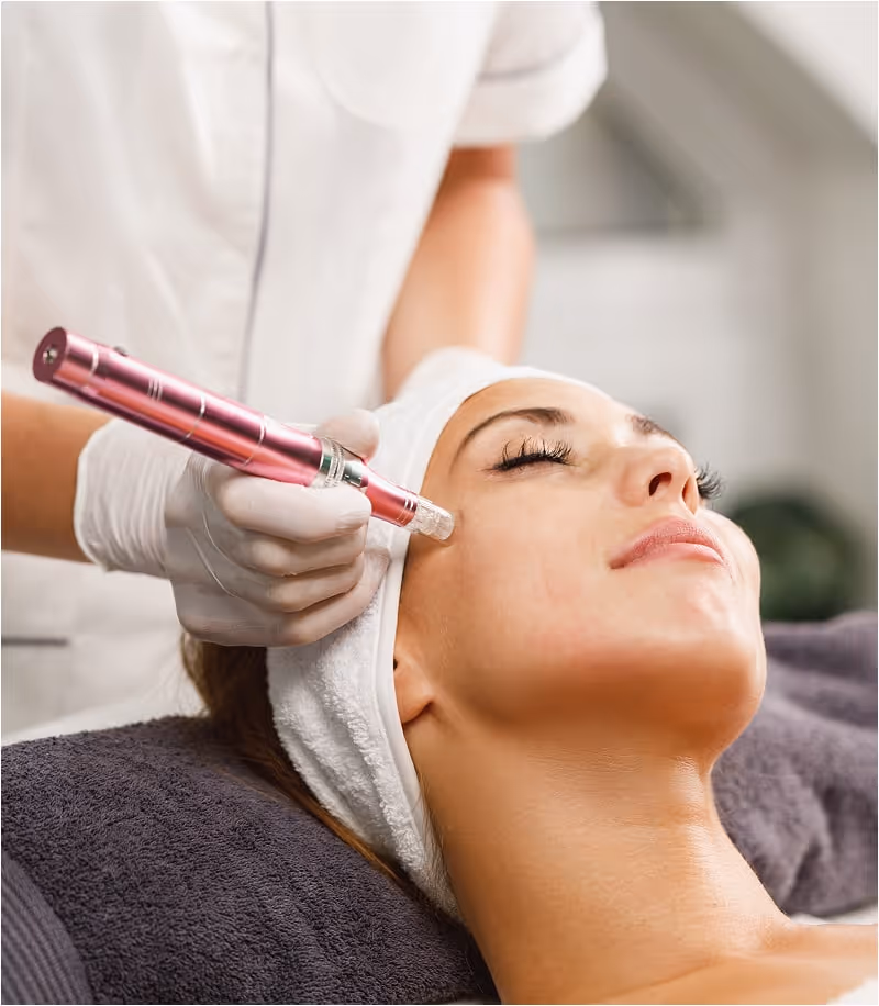 Woman receiving Hydrafacial treatment at medical spa