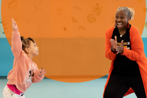 teacher and student celebrate joyful classroom
