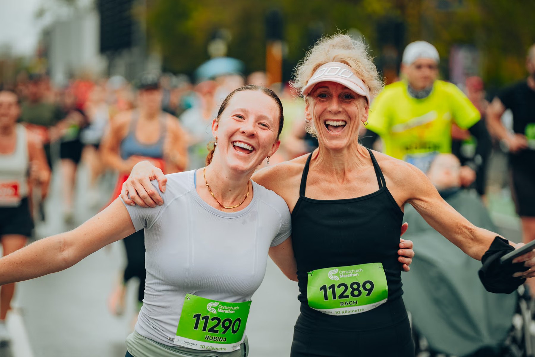 Two finishers embrace