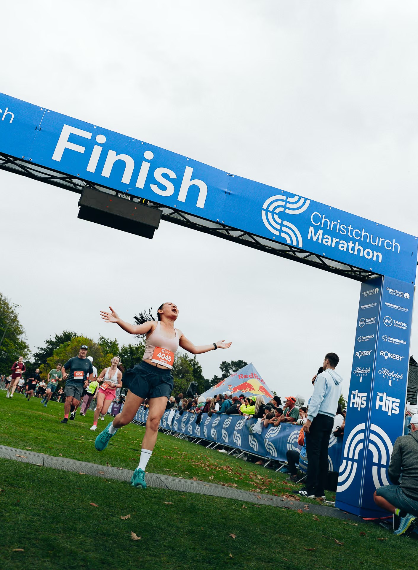Finish line, arms up