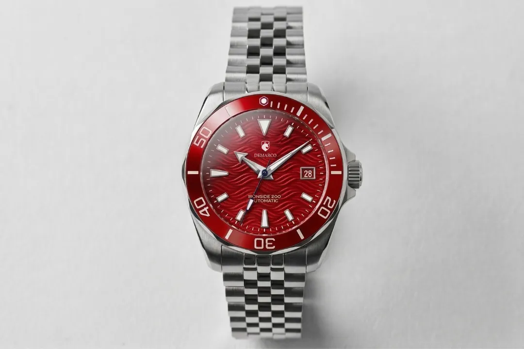 The Ironside 200 Rockport Red photographed from above, showing the red ceramic bezel insert and its printed minute markings