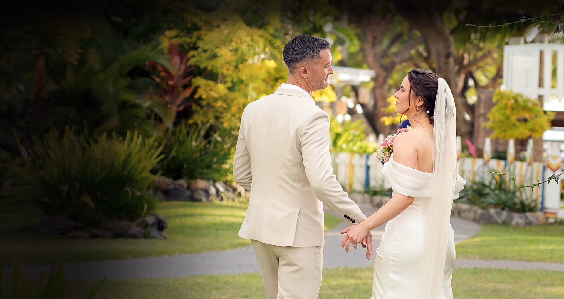 Bride and groom holding hands 