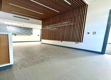 Jobsite photo of vinyl plank install at education facility.