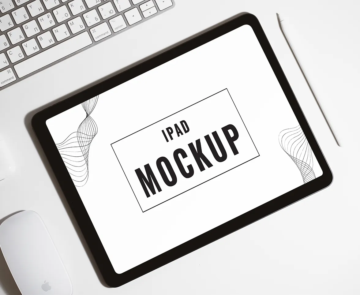 Top view of a tablet mockup with "PSD MOCKUP" text on the screen.