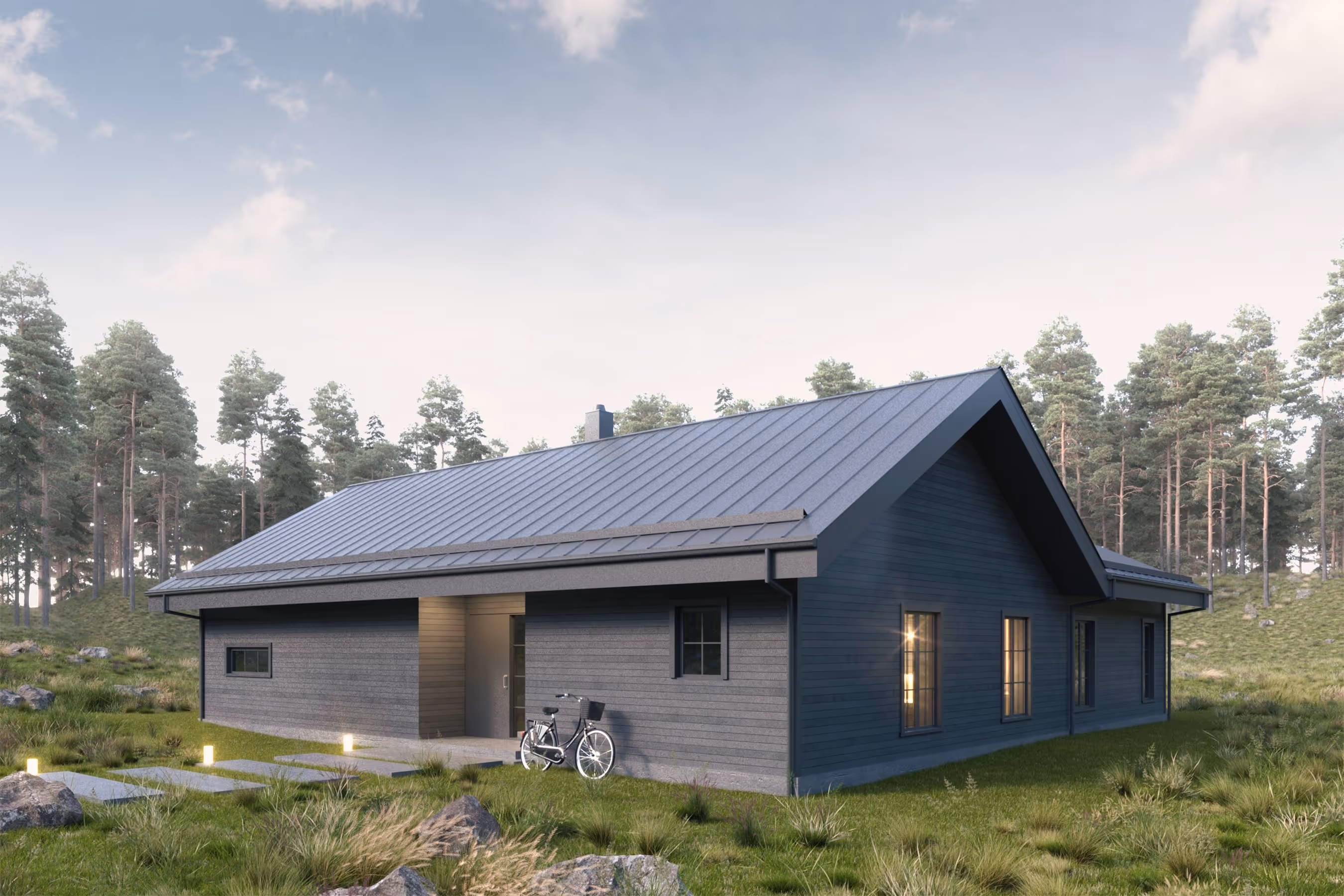 Modern single-story dark gray house with a sloped metal roof, lit windows, and a bicycle parked near the entrance, surrounded by grass and trees.