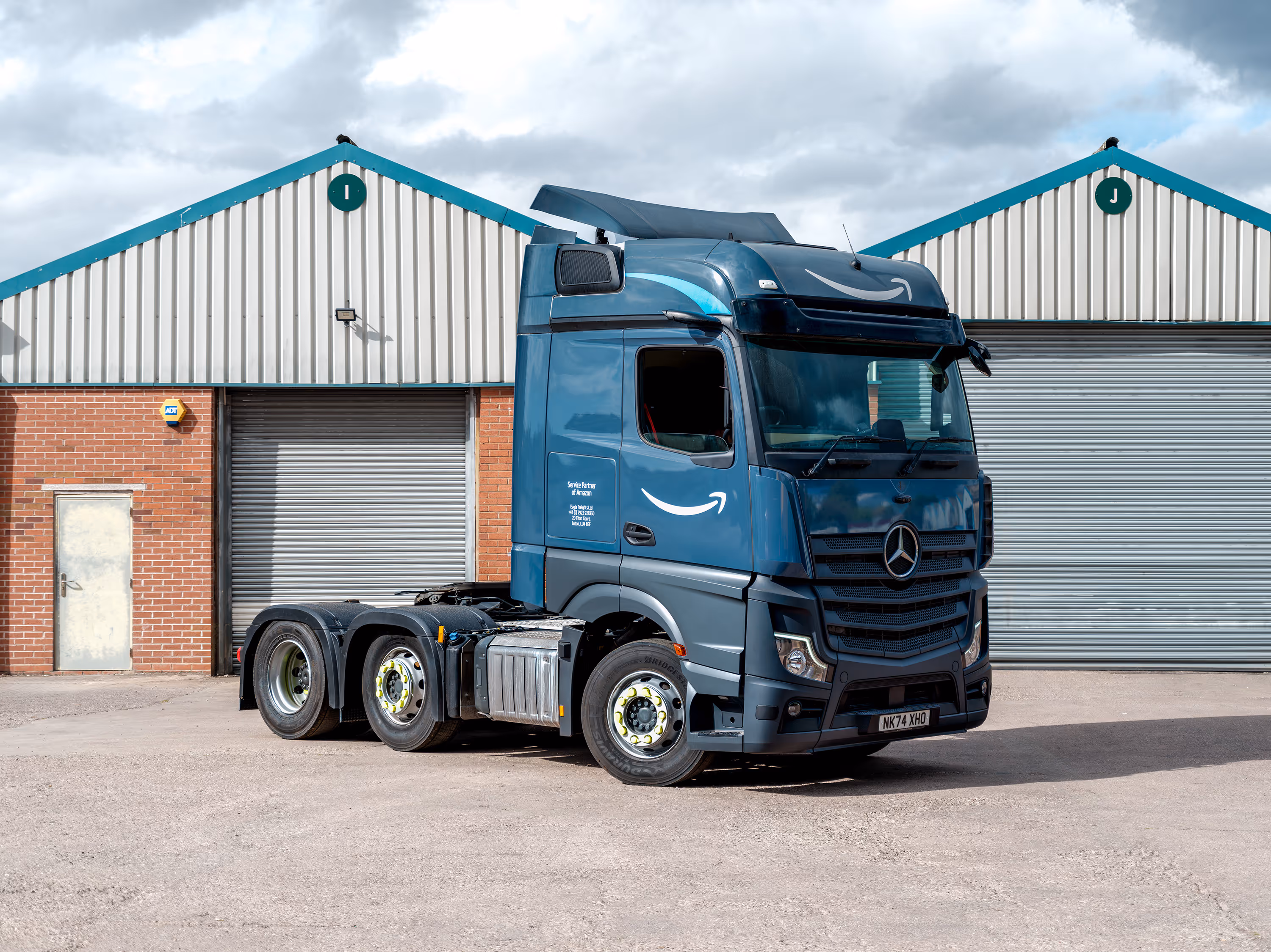 Amazon Prime fleet Mercedes truck repaired, painted, and branded by WCC.