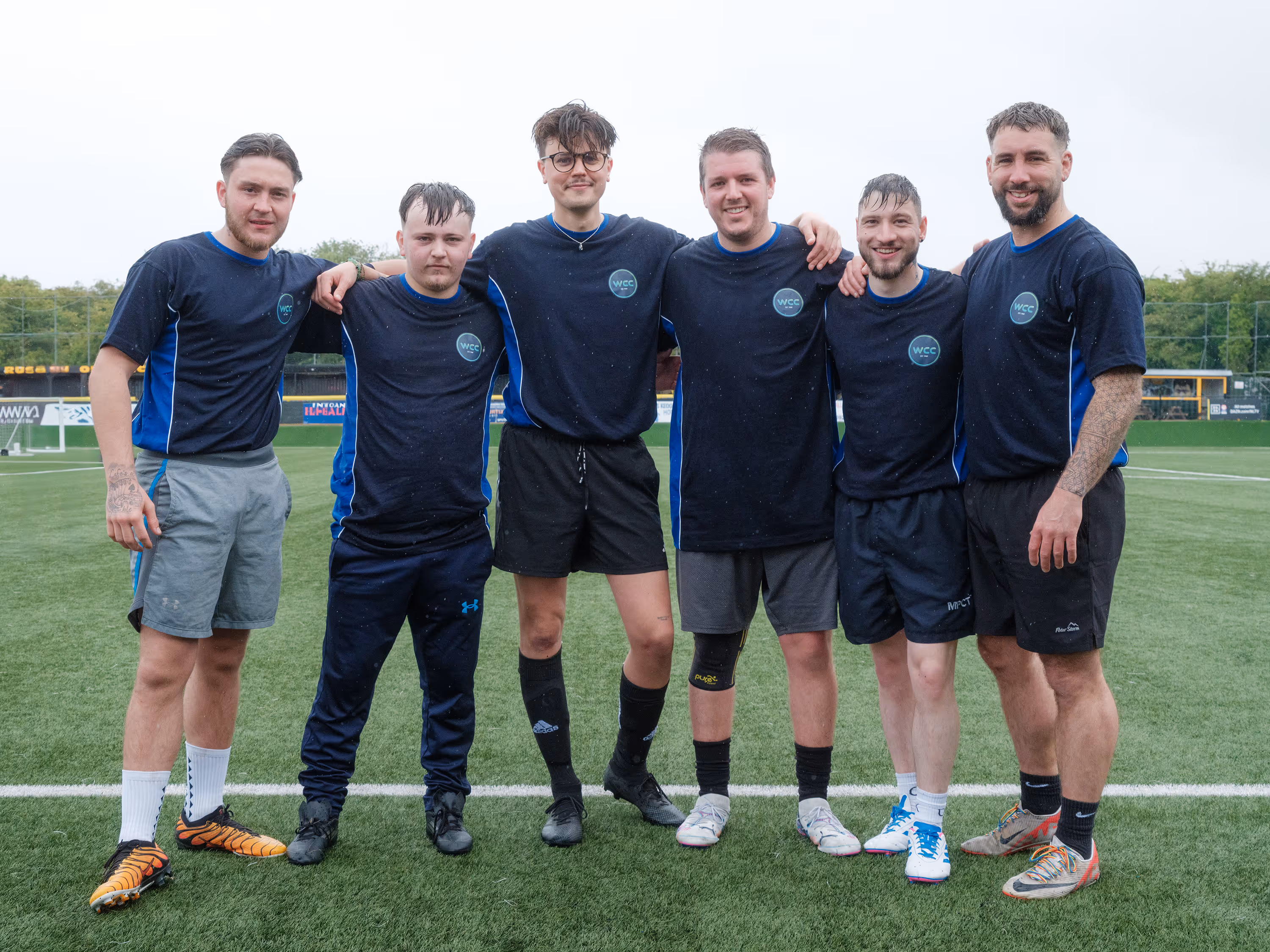 The WCC team before playing a charity football match.