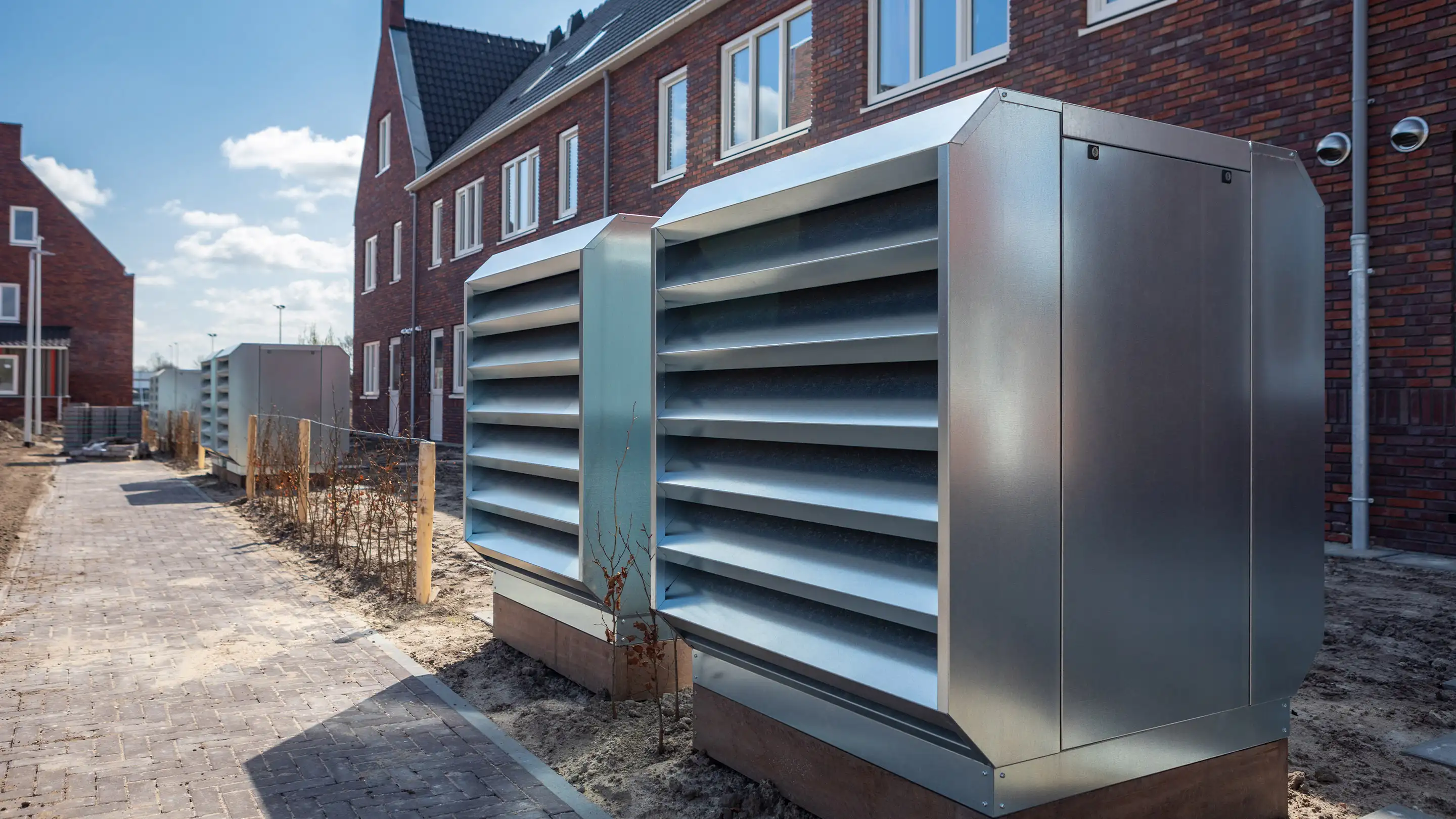 DICE noise control enclosures next to the houses of AZC Burgurm.