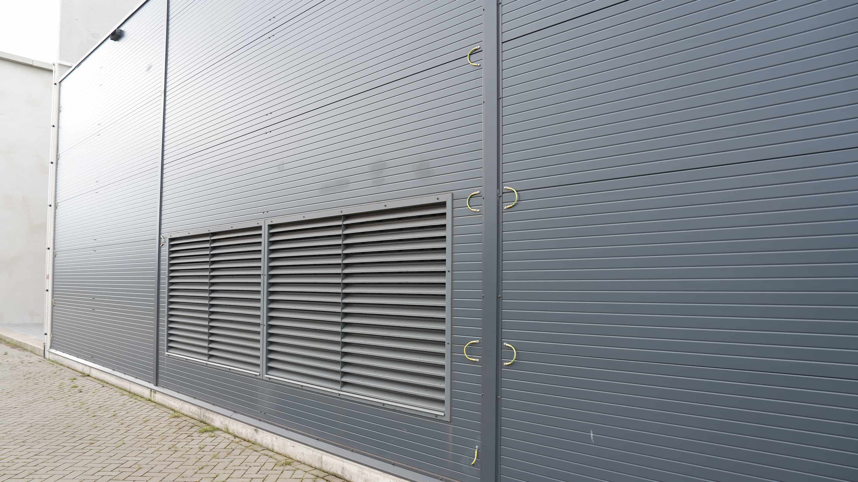Ventilation grilles outside of the noise control enclosure of TenneT at Wijk aan Zee.