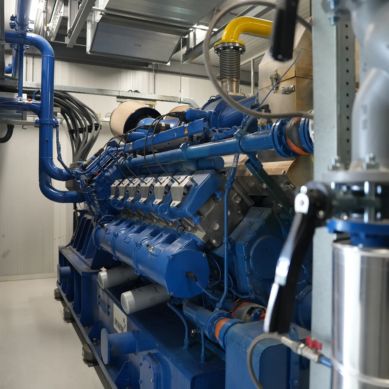 Compressor inside noise reduction enclosure at WPK Made.