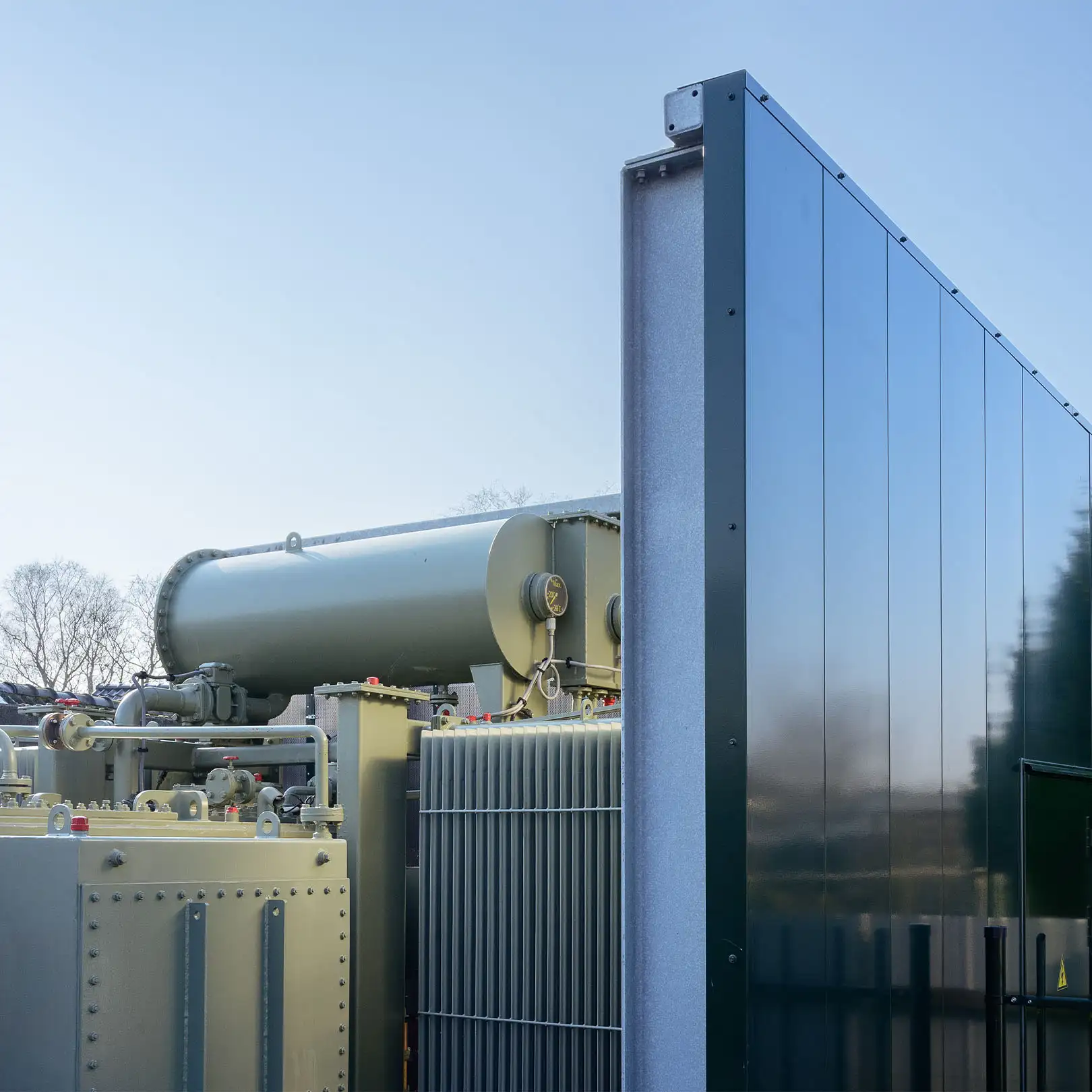 Close-up of noise barrier and transformer station at Enexis Zevenhuizen, Groningen.