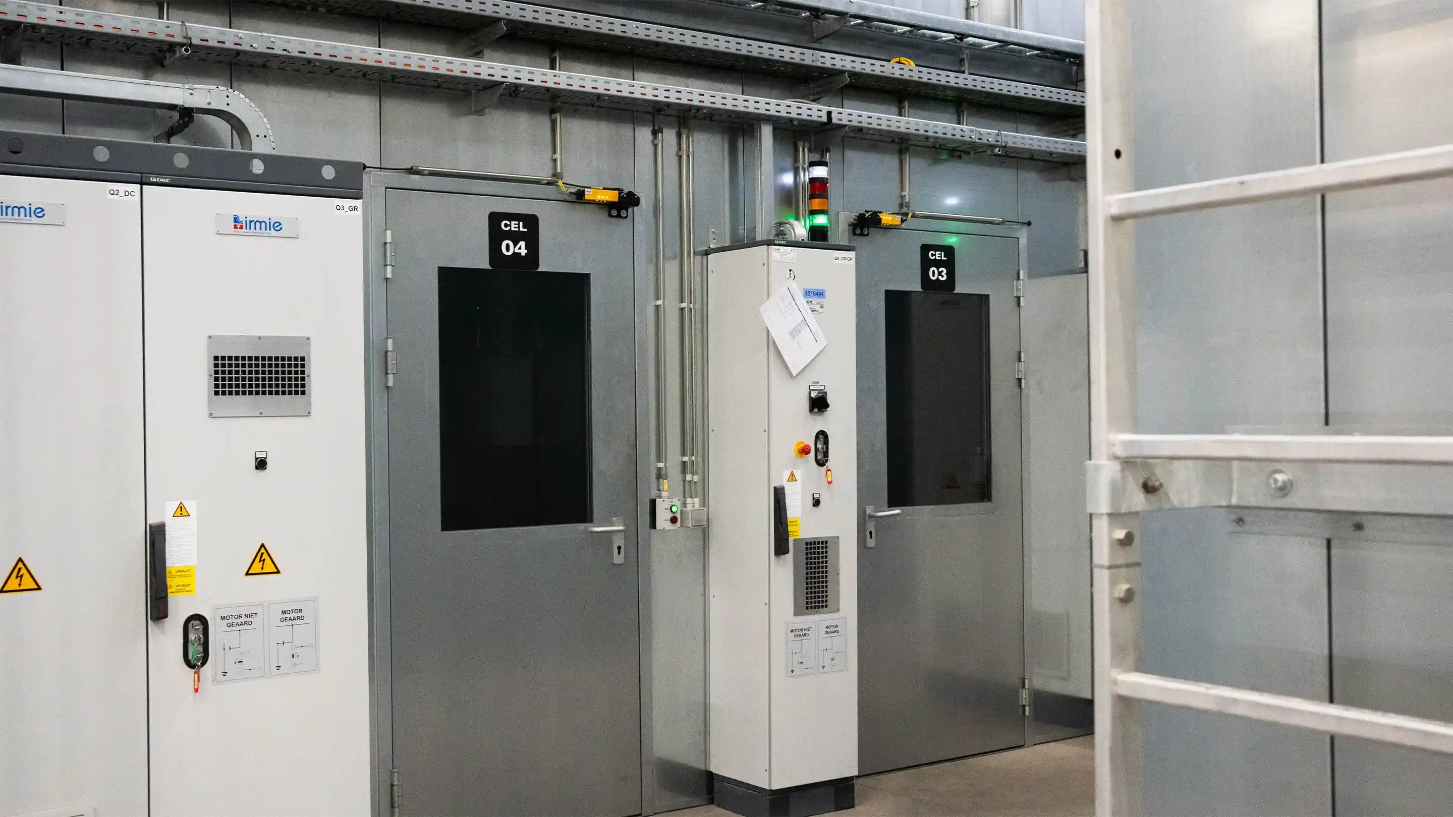 Acoustic test cells with insulated doors and control systems.