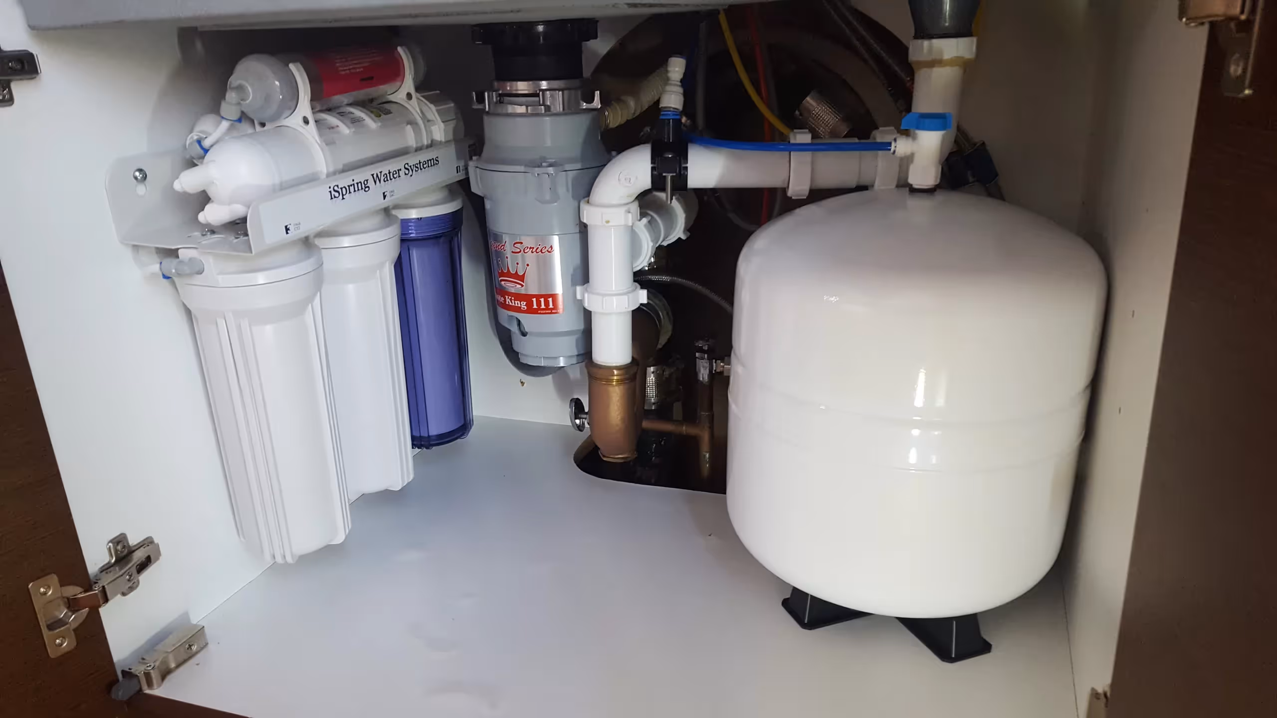 Under sink water filtration system and tank.