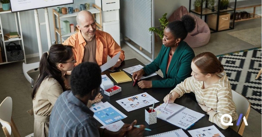 A group of businesspeople in a meeting to review business case tool providers