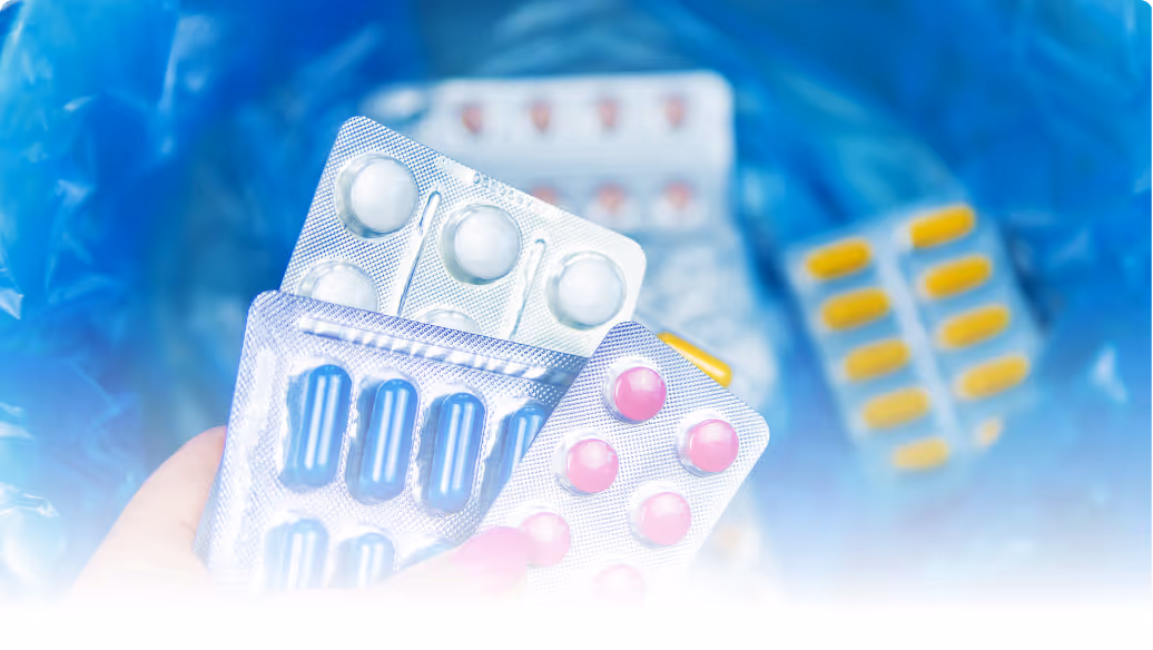 A selection of tablets being thrown away