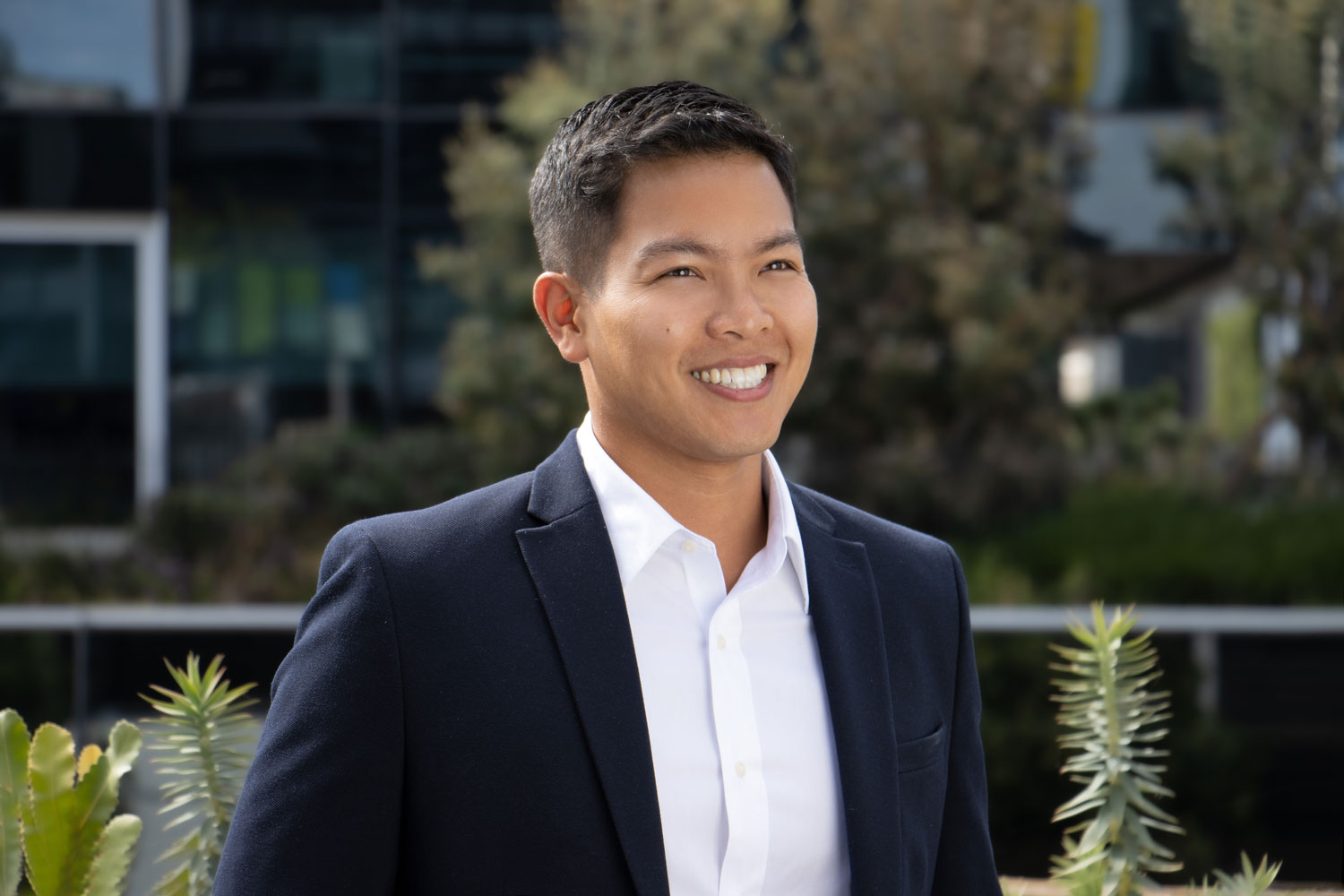 Morikot Keo in dark navy suit