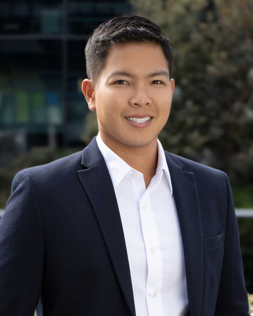 Morikot Keo in dark navy suit