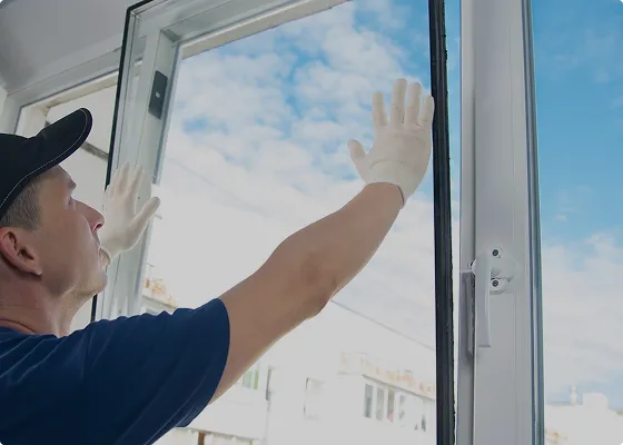 Glasscare technician installing glass