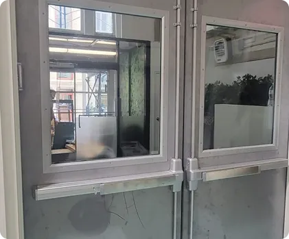 Newly installed double glass doors with metal handles