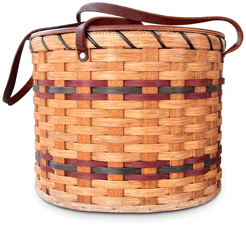 Handwoven wicker breakfast delivery basket with leather handles used for morning meal service at Fredericksburg Bed & Breakfast