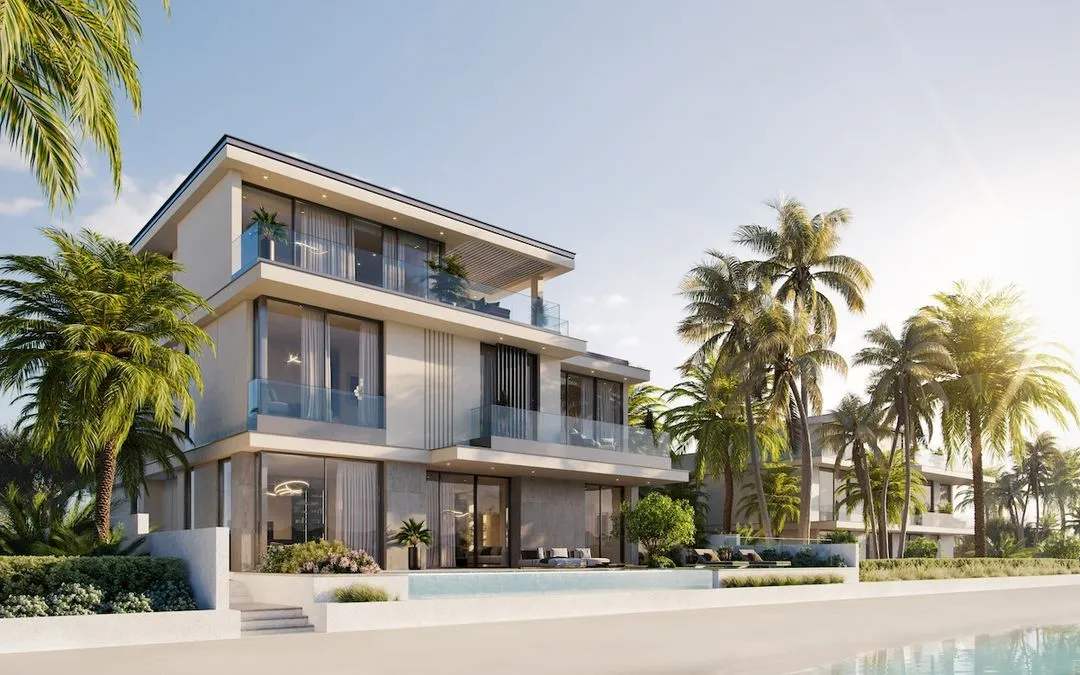 A luxury villa with a private pool overlooking the beach at Palm Jebel Ali.