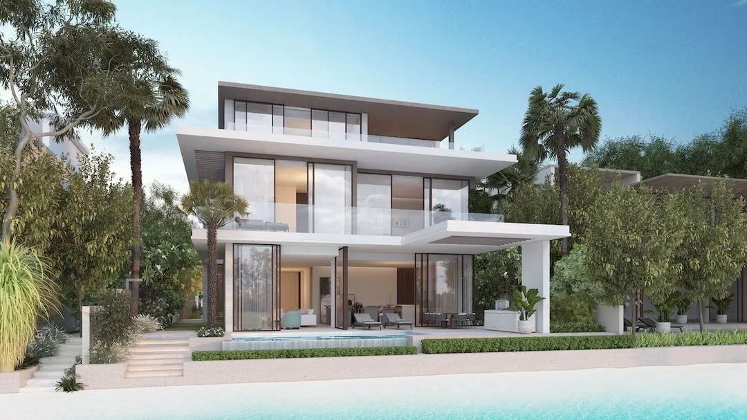 A luxury villa with a private pool overlooking the beach at Palm Jebel Ali.