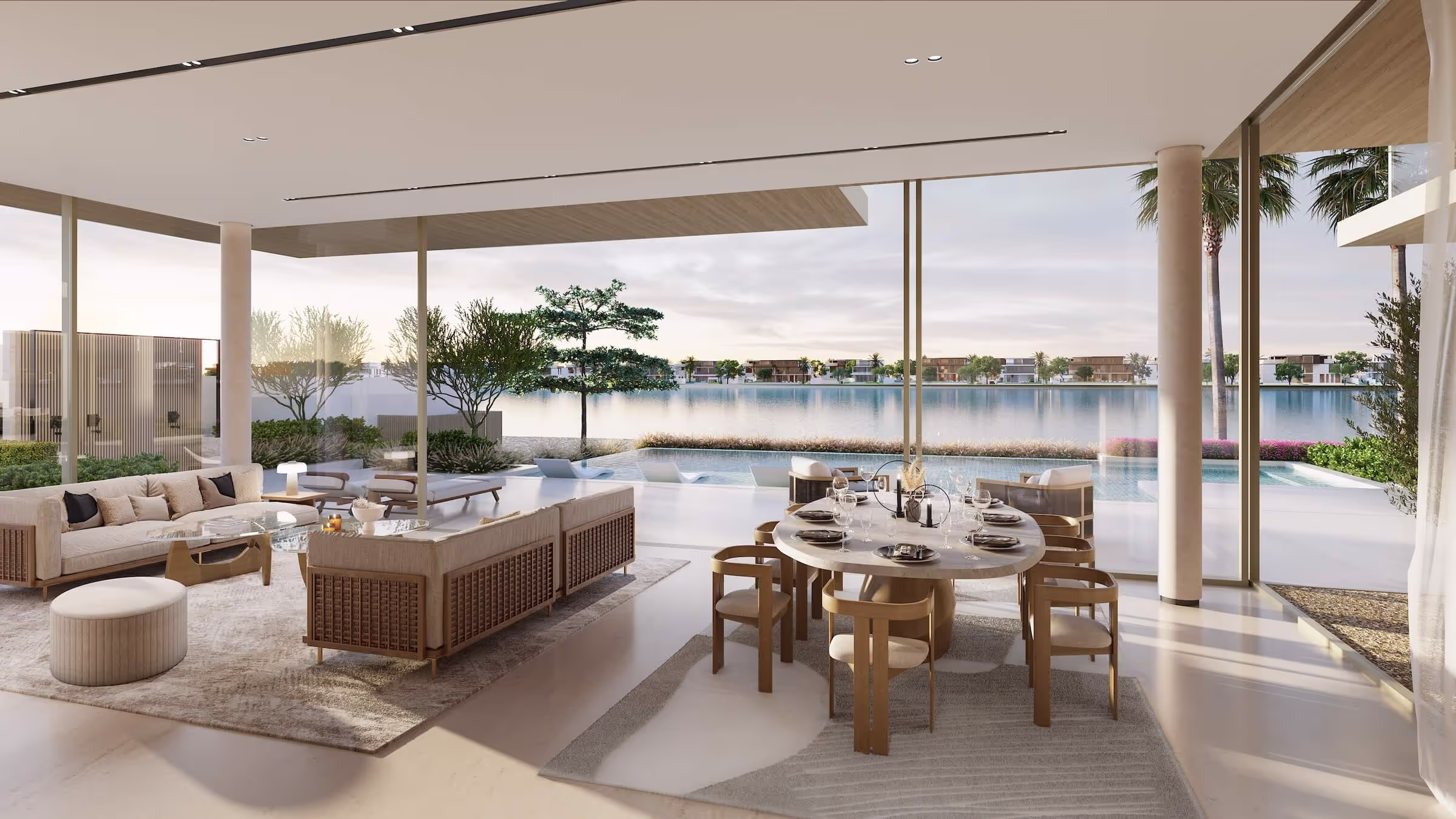 An aerial view of the Palm Jebel Ali villas surrounded by water, with a beach along its outer edge.
