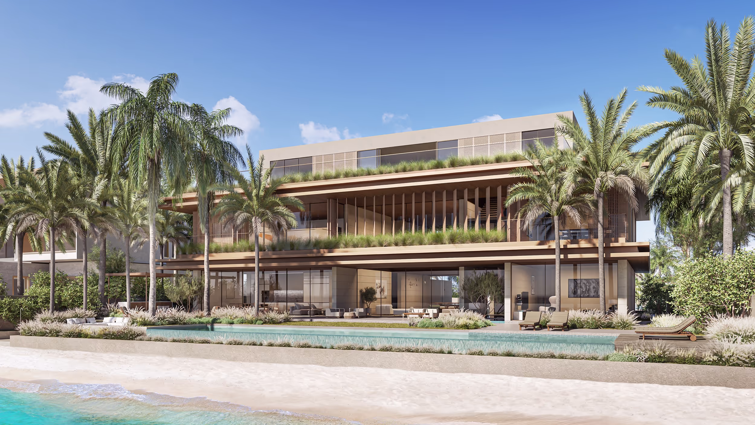 Luxury villa showcasing a private pool, palm trees, and a stunning beachfront location.