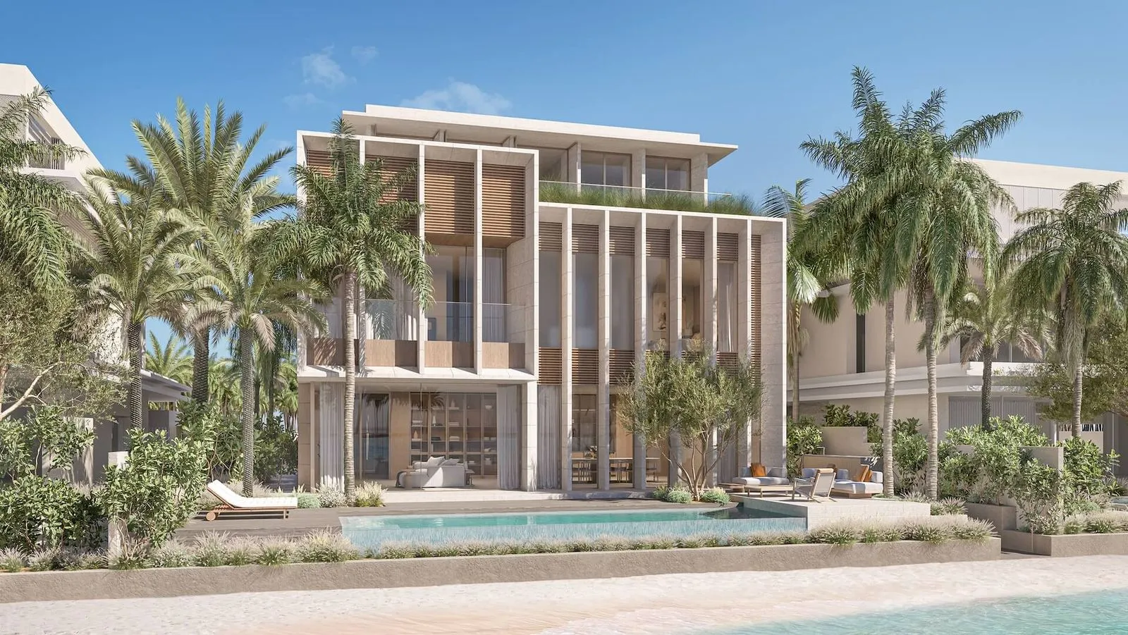 A luxury villa with a private pool overlooking the beach at Palm Jebel Ali.