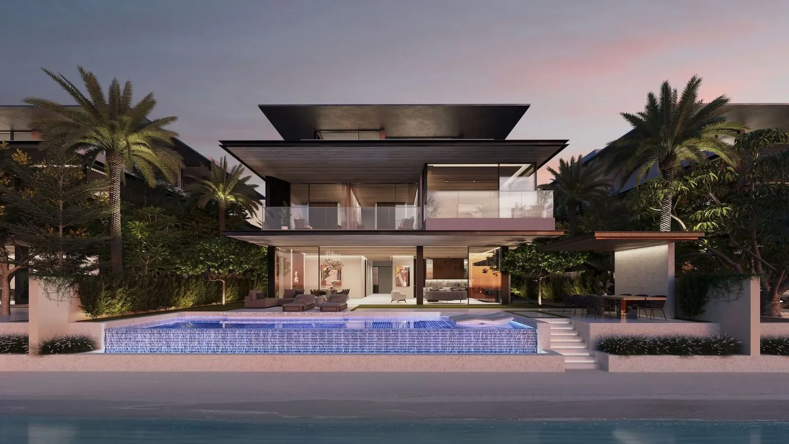 A luxury villa with a private pool overlooking the beach at Palm Jebel Ali.