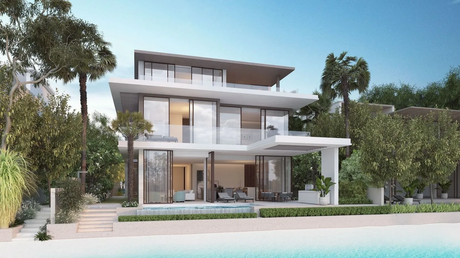 A luxury villa with a private pool overlooking the beach at Palm Jebel Ali.