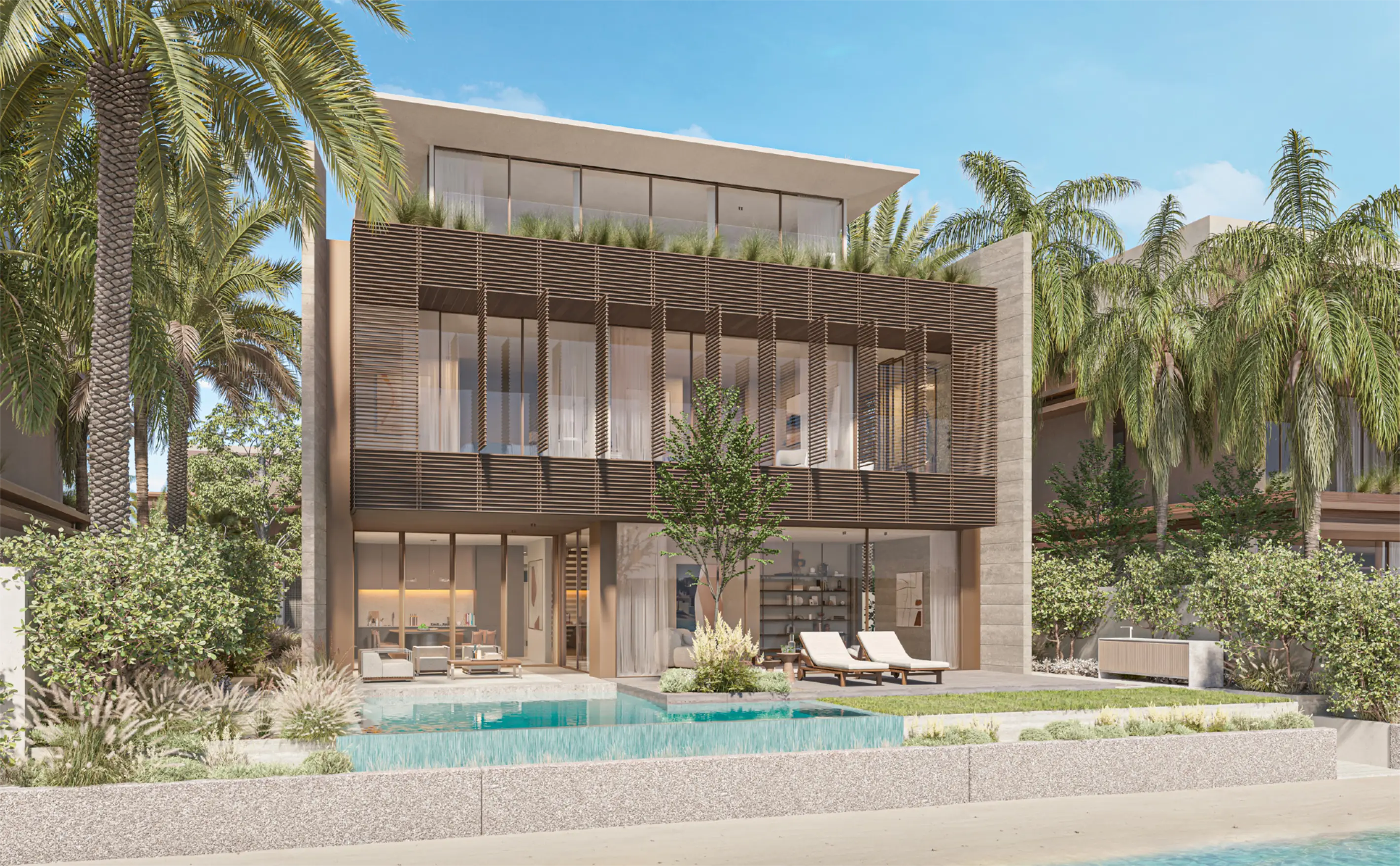 A luxury villa with a private pool overlooking the beach at Palm Jebel Ali.